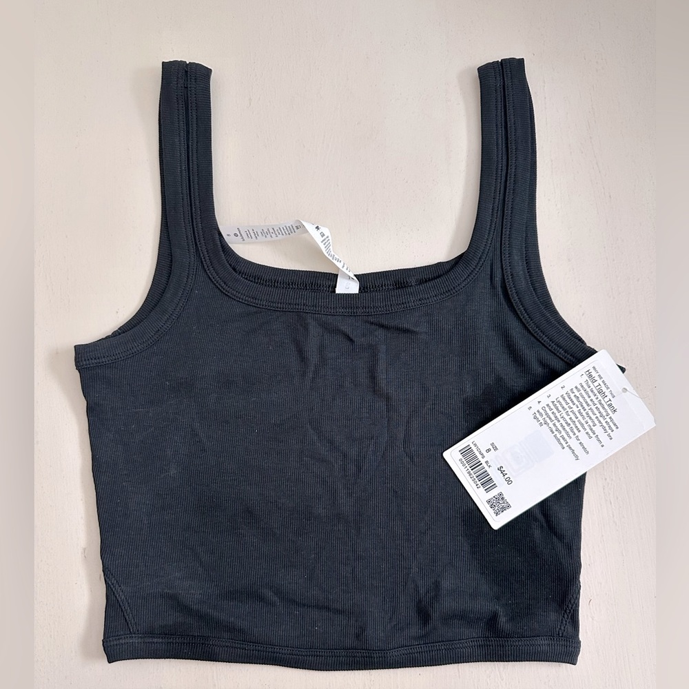NWT womens Lululemon Held Tight Tank. Black, Sz 8. Fitted, thin rib, crop tank.